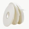 closeup image of three white Scapa Double Coated Polyethylene Foam Tapes measuring 1/16″ Thick x 1″ x 36 yd